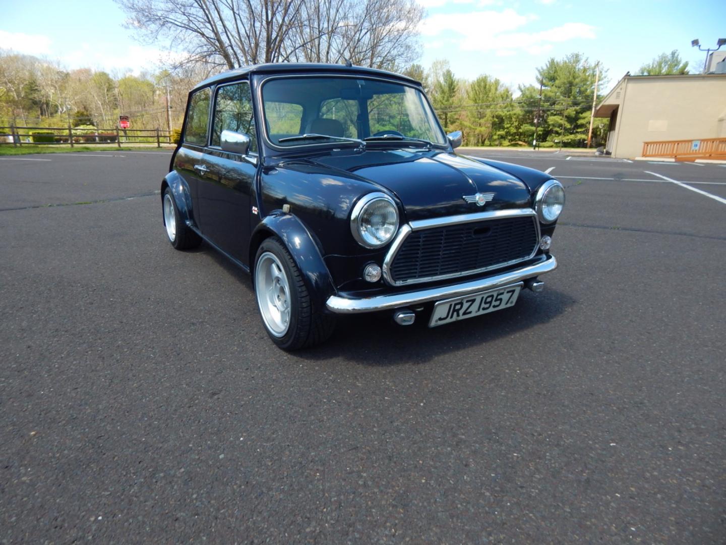 1984 Blue /Beige Leather Austin Mini Sport (A/A25751477) with an 1275cc 4 cylinder engine, Manual transmission, located at 6528 Lower York Road, New Hope, PA, 18938, (215) 862-9555, 40.358707, -74.977882 - The title to this car says she is a 1964, however in the sixties the door hinges were on the outside of the doors, also the windows in the sixties cars were sliding instead of roll up. We believe the year of this vehicle is 1984 due to the rear taillights. Here we have a beautifully restored A - Photo#2